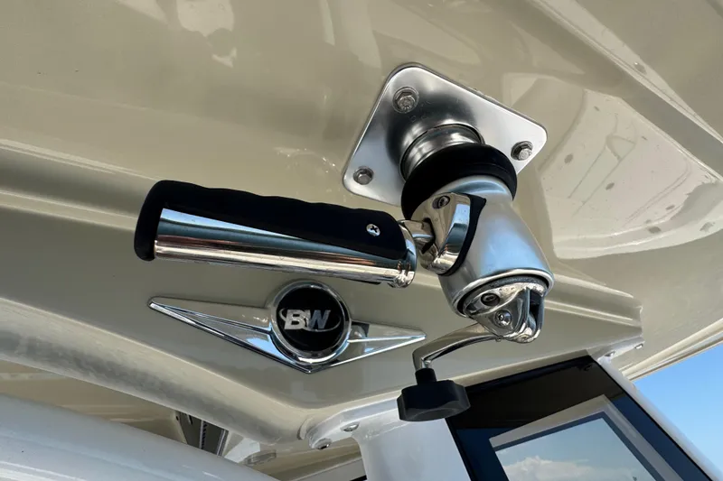 Slide: The Image of Close-up of a 2025 Blackwater 23 Bay boat handle and logo. - 34