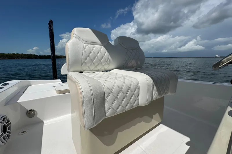 Slide: The Image of Luxury seating on 2025 Blackwater 23 Bay boat with ocean view. - 55