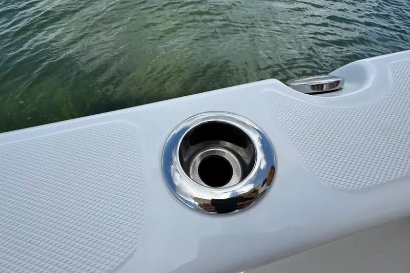 Slide: The Image of Cup holder on 2025 Blackwater 23 Bay boat, near water surface. - 56