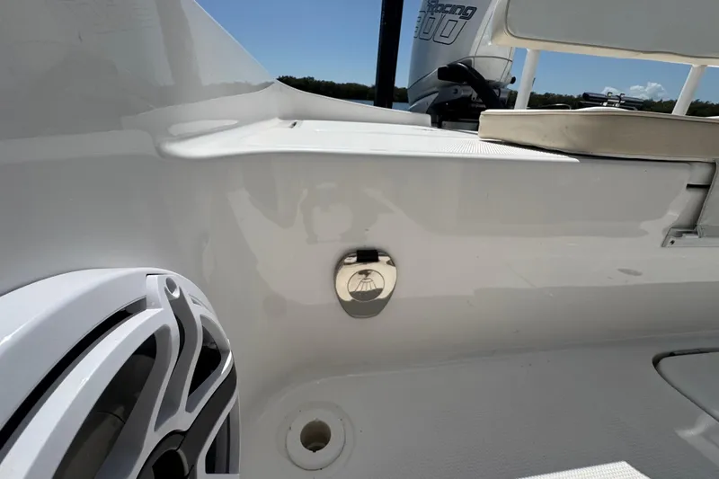 Slide: The Image of 2025 Blackwater 23 Bay boat interior with speaker and seating detail. - 65