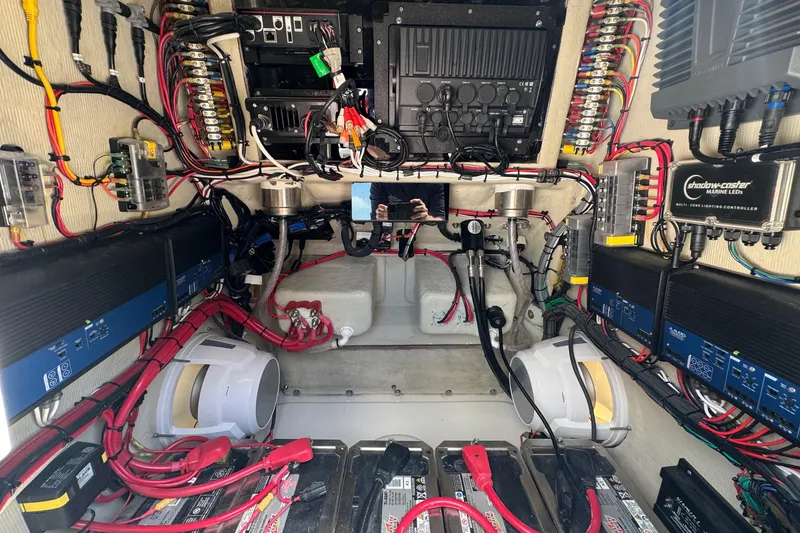 Slide: The Image of Electrical system setup in a 2025 Blackwater 23 Bay boat, featuring wiring and components. - 72