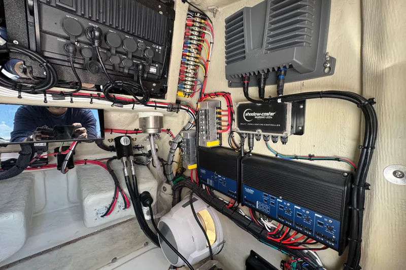 Slide: The Image of Electrical system setup in 2025 Blackwater 23 Bay boat, featuring advanced marine electronics. - 74