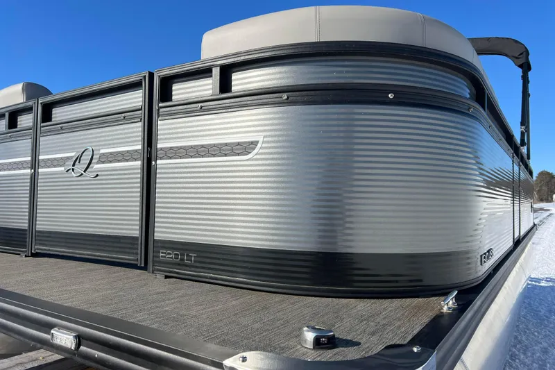 Slide: The Image of 2024 Qwest 8520 DH RLS LT pontoon boat with sleek silver exterior design. - 11