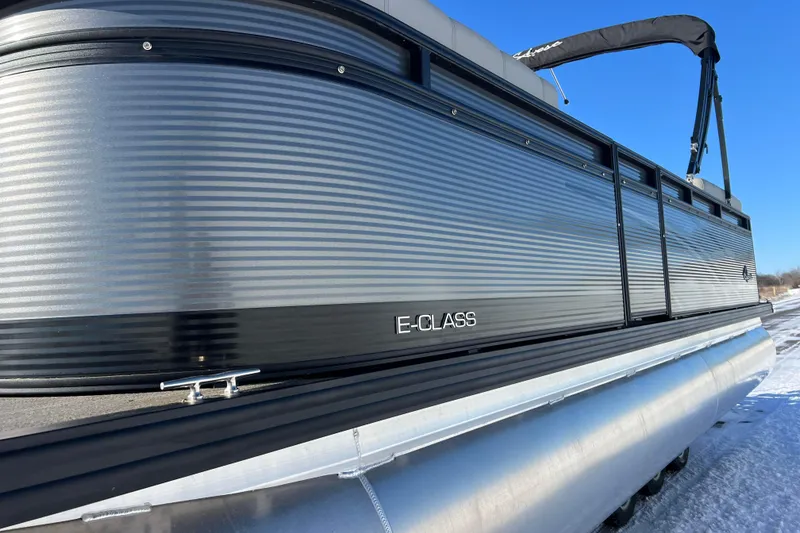 Slide: The Image of 2024 Qwest 8520 DH RLS LT pontoon boat, E-Class, sleek design, sunny day. - 12