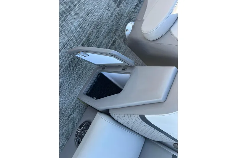 Slide: The Image of 2024 Qwest 8520 DH RLS LT boat seat with open storage compartment. - 17