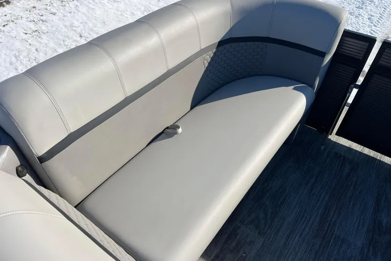 Slide: The Image of Luxurious seating on 2024 Qwest 8520 DH RLS LT pontoon boat, featuring sleek gray upholstery. - 22