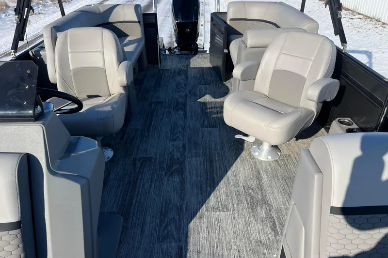 Slide: The Image of 2024 Qwest 8520 DH RLS LT boat interior with plush seating and modern design. - 26