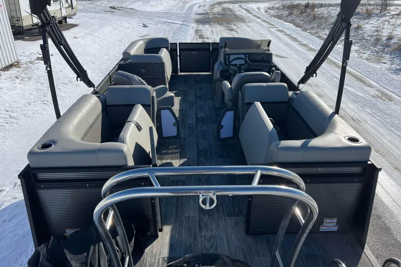Slide: The Image of 2024 Qwest 8520 DH RLS LT pontoon boat with spacious seating on snowy terrain. - 3