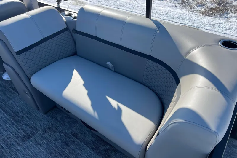 Slide: The Image of 2024 Qwest 8520 DH RLS LT boat seat with gray upholstery and cup holders. - 31