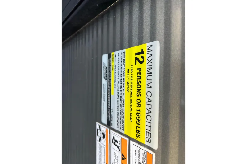 Slide: The Image of Qwest 8520 DH RLS LT 2024 capacity label, maximum 12 persons or 1699 lbs. - 34