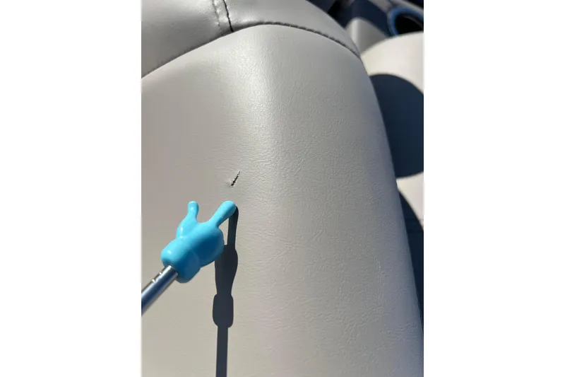 Slide: The Image of Small tear on Qwest 8520 DH RLS LT 2024 seat with blue pointer. - 40