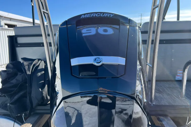 Slide: The Image of 2024 Qwest 8520 DH RLS LT boat with Mercury 90 engine, rear view. - 5