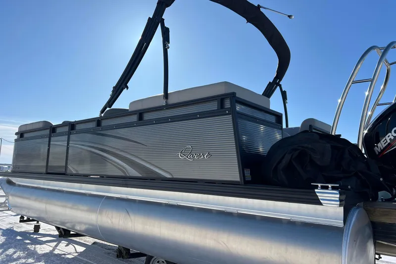 Slide: The Image of 2024 Qwest 8520 DH RLS LT pontoon boat under clear blue sky. - 6