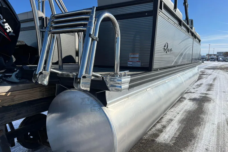 Slide: The Image of 2024 Qwest 8520 DH RLS LT pontoon boat with ladder and Mercury engine. - 8
