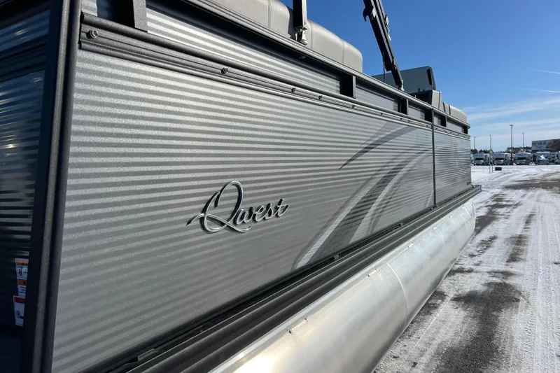 Slide: The Image of 2024 Qwest 8520 DH RLS LT pontoon boat in snowy outdoor setting. - 9