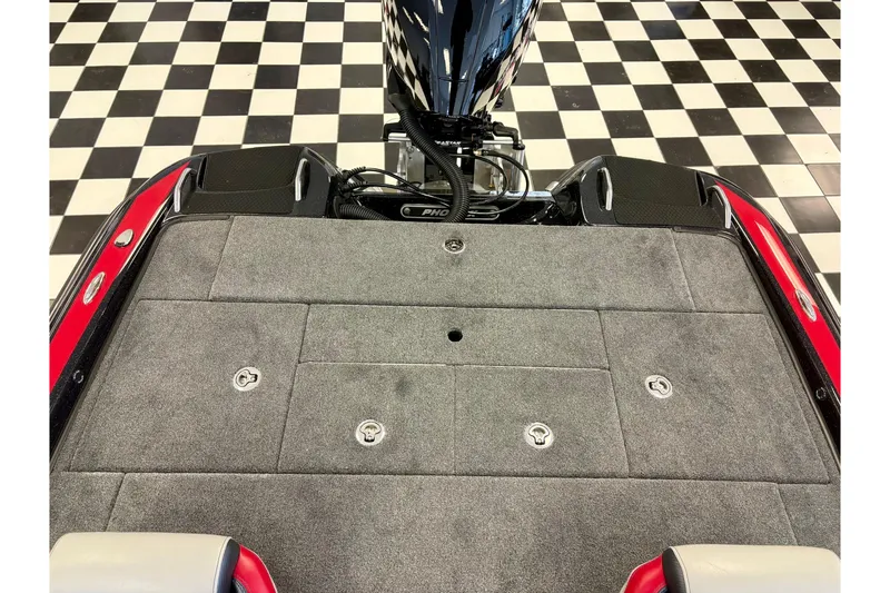 Slide: The Image of 2026 Phoenix 819 ZXL boat deck with checkered floor background. - 11