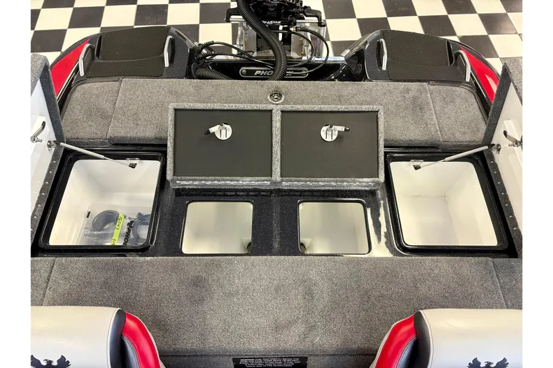 Slide: The Image of Interior of 2026 Phoenix 819 ZXL boat with storage compartments and checkered floor. - 12
