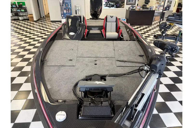 Slide: The Image of 2026 Phoenix 819 ZXL boat interior with checkered floor showroom display. - 15