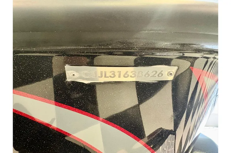 Slide: The Image of 2026 Phoenix 819 ZXL boat with identification number CJL3163B626 on the hull. - 16