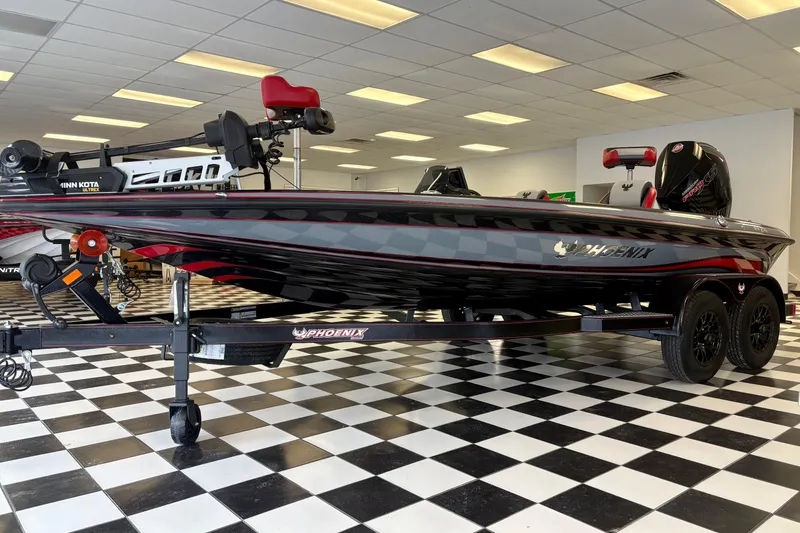 Slide: The Image of 2026 Phoenix 819 ZXL boat on checkered floor in showroom. - 4