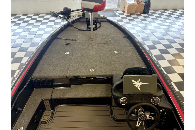 Slide: The Image of 2026 Phoenix 819 ZXL boat interior with steering wheel and control panel. - 6