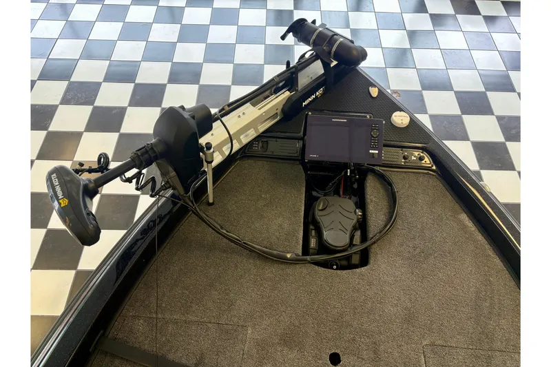 Slide: The Image of Front deck of 2026 Phoenix 819 ZXL boat with trolling motor and electronics. - 7