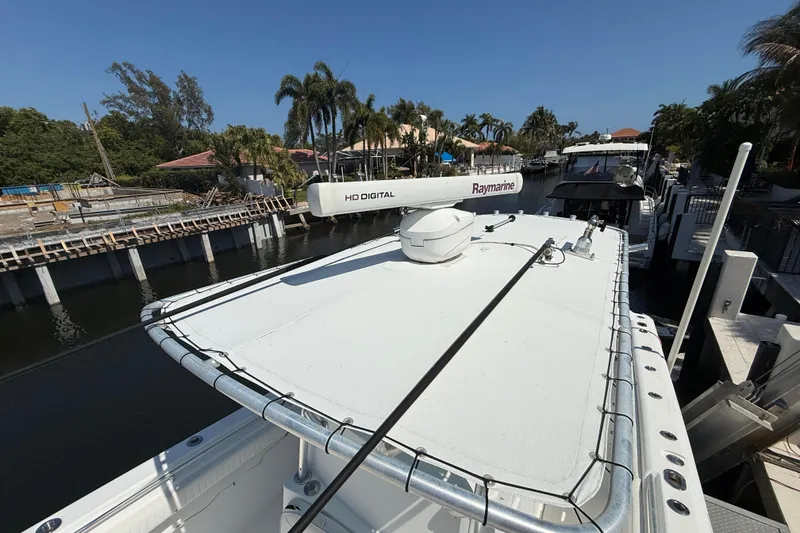 Slide: The Image of 2003 Palmetto 33 Adventure boat with Raymarine HD Digital radar, docked in a scenic canal. - 10