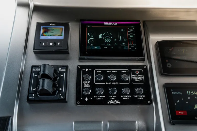 Slide: The Image of Control panel of Maori 54XL 2025 boat with navigation and lighting controls. - 17