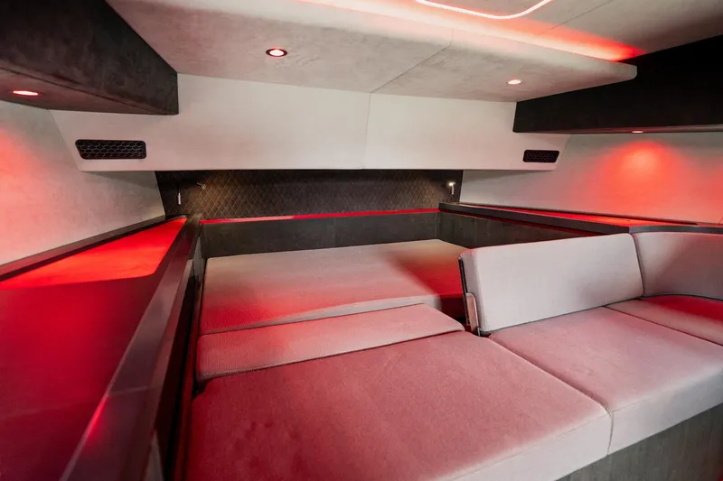Slide: The Image of Luxurious interior of 2025 Maori 54XL yacht with modern seating and ambient lighting. - 25