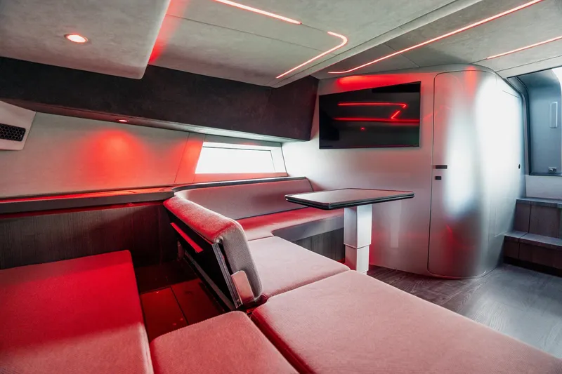 Slide: The Image of Luxurious interior of 2025 Maori 54XL yacht with modern seating and ambient lighting. - 26