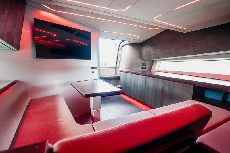 Slide: The Image of Luxurious interior of 2025 Maori 54XL yacht with modern seating and ambient lighting. - 29