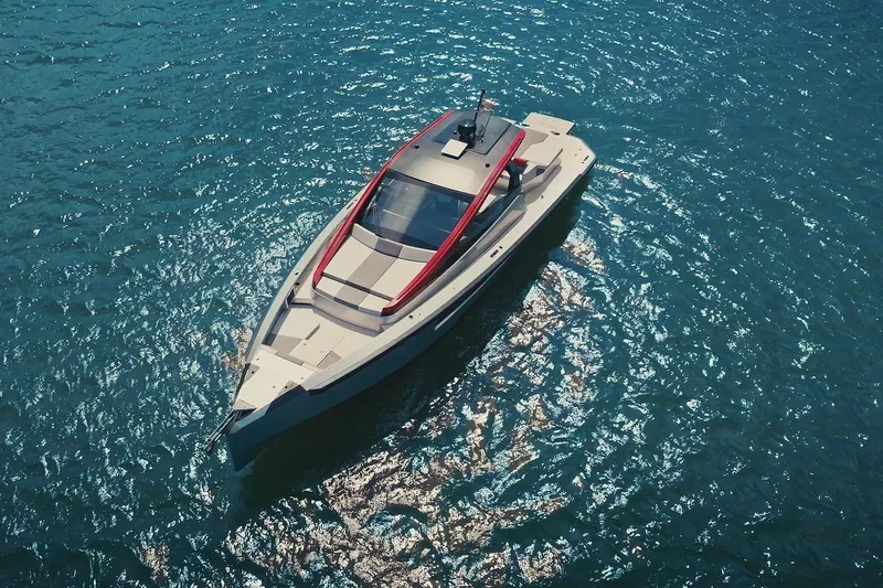 Slide: The Image of Aerial view of 2025 Maori 54XL yacht on sparkling blue water. - 8