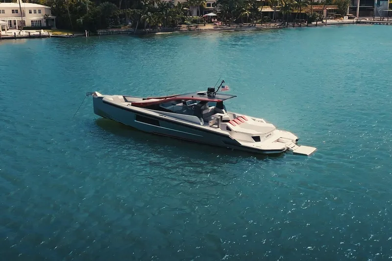 Slide: The Image of Luxury Maori 54XL yacht from 2025 on serene blue waters. - 9