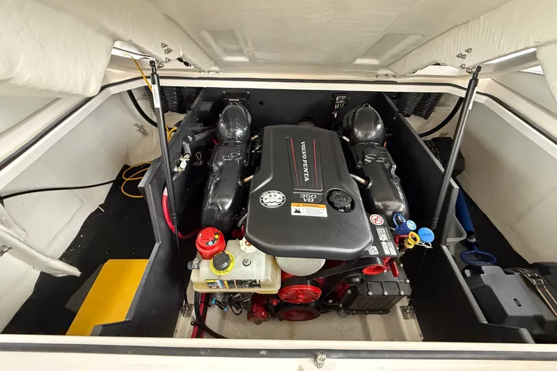 Slide: The Image of 2024 Regal LS4 engine compartment featuring a Volvo Penta 350 V8 engine. - 13