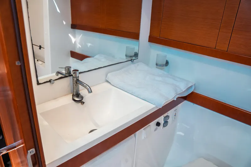 Slide: The Image of Beneteau Oceanis 50 bathroom sink with wooden cabinetry, 2011 model. - 25
