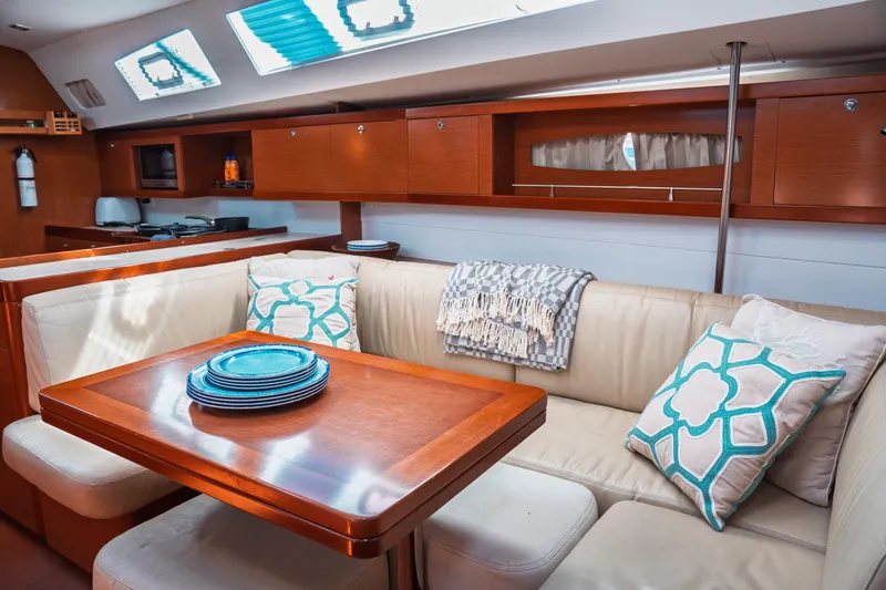 Slide: The Image of Luxurious interior of 2011 Beneteau Oceanis 50 yacht with elegant seating and dining area. - 33