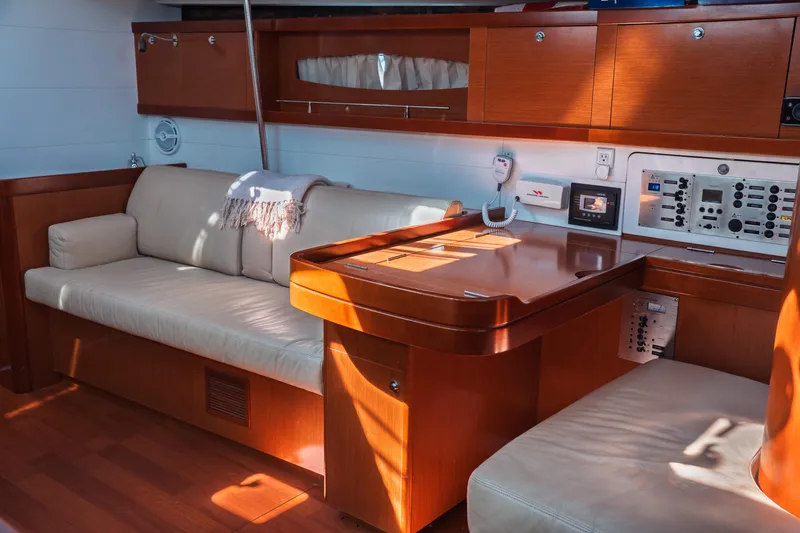 Slide: The Image of Luxurious interior of 2011 Beneteau Oceanis 50 yacht with elegant wood finish and comfortable seating. - 38