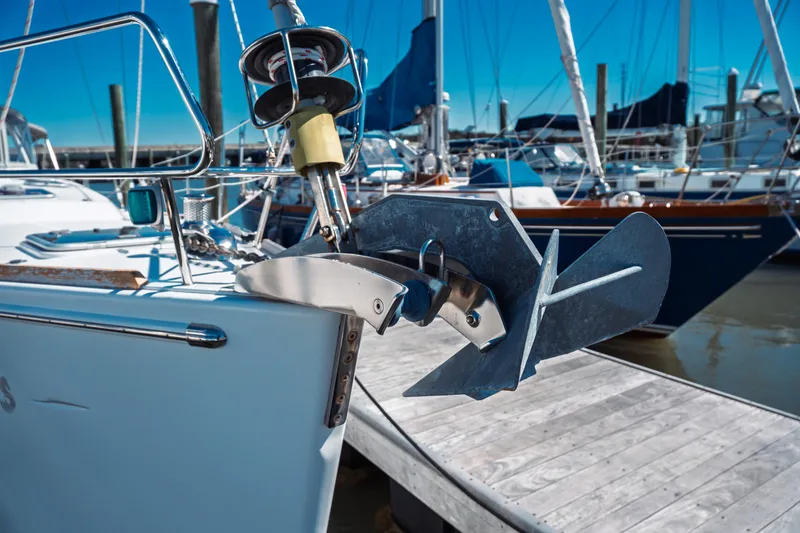 Slide: The Image of Bow of 2011 Beneteau Oceanis 50 yacht with anchor at marina dock. - 4