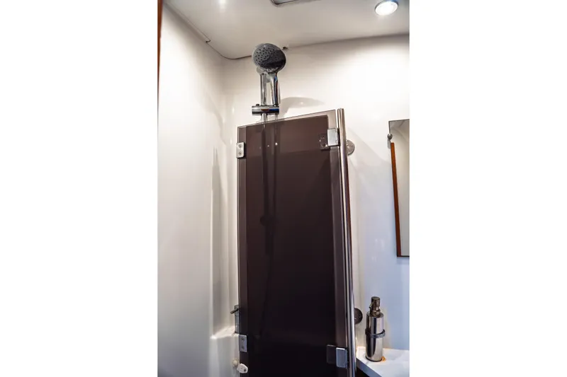 Slide: The Image of Shower area in 2011 Beneteau Oceanis 50 yacht, featuring modern fixtures and sleek design. - 48