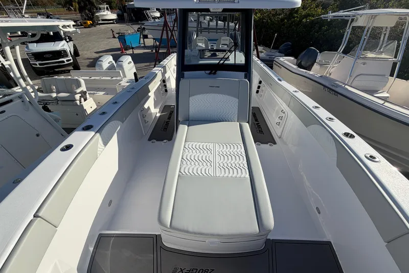 Slide: The Image of 2026 Twin Vee 280 GFX2 CC boat interior, featuring sleek seating and modern design. - 10