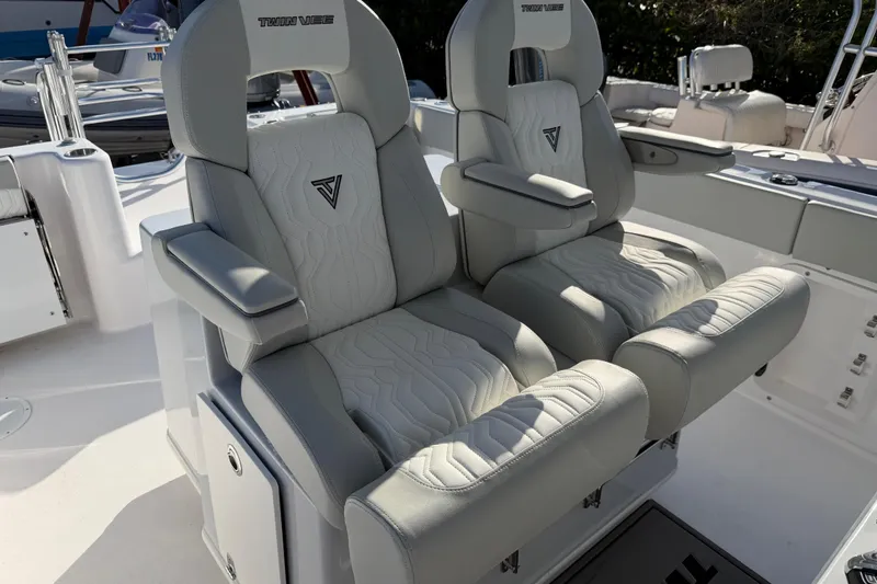 Slide: The Image of Luxury seating on 2026 Twin Vee 280 GFX2 CC boat, featuring premium upholstery and design. - 6