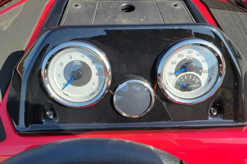 Slide: The Image of Dashboard of 2026 Smoker Craft Lazer 161 boat with RPM and speed gauges. - 9