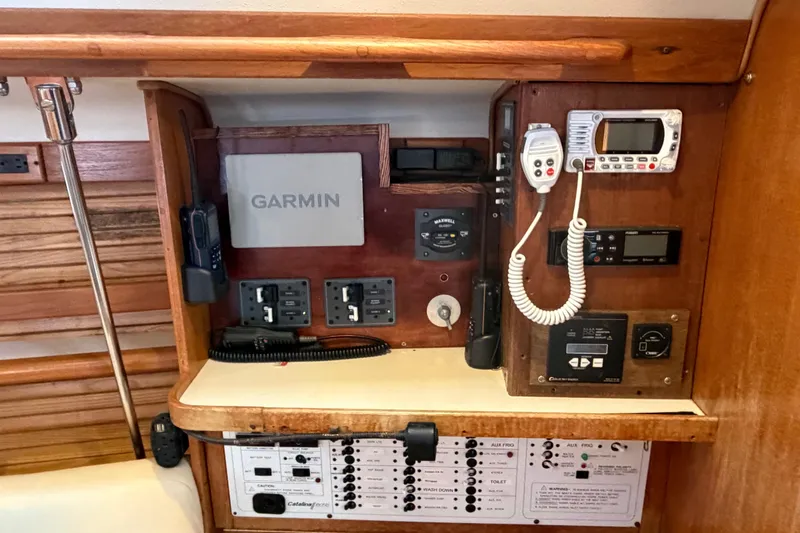 Slide: The Image of Control panel of a 1998 Catalina 380 sailboat with Garmin navigation equipment. - 10