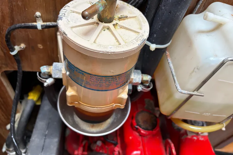 Slide: The Image of Fuel filter system in a 1998 Catalina 380 engine compartment. - 45