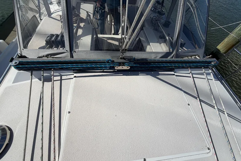 Slide: The Image of Deck view of a 1998 Catalina 380 sailboat with rigging and ropes. - 58