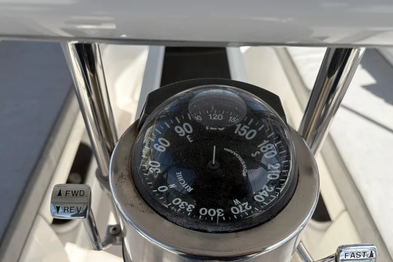 Slide: The Image of Compass and controls on a 1998 Catalina 380 sailboat. - 70