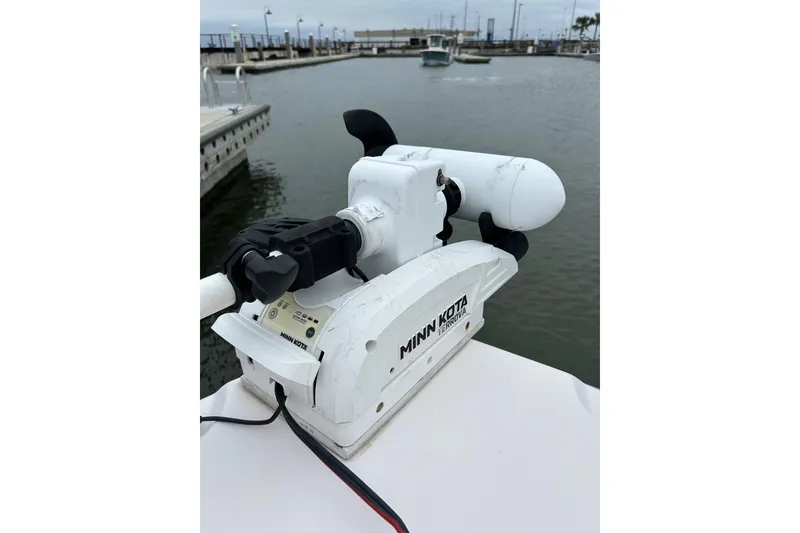 Slide: The Image of Minn Kota Terrova trolling motor on 2011 Grady-White Freedom 225 boat at marina. - 17