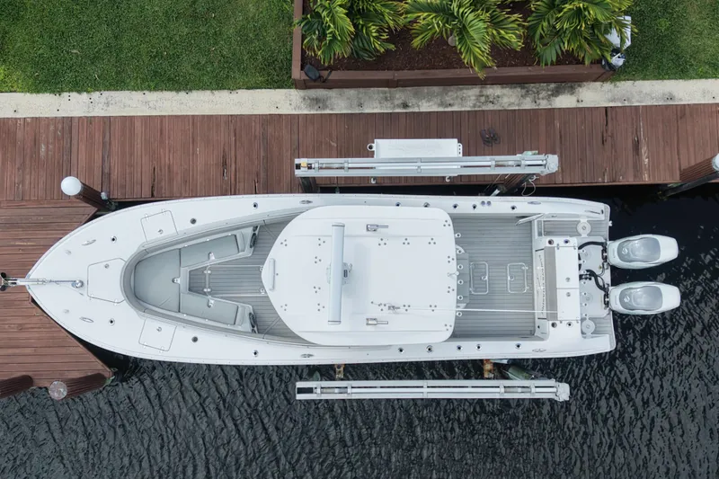 Slide: The Image of Top view of a 2023 Cape Horn 32 XS boat docked by wooden pier. - 10