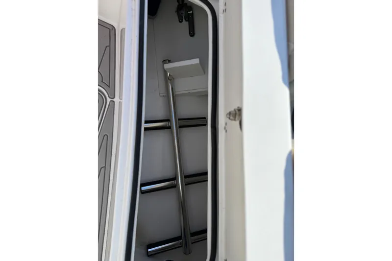 Slide: The Image of 2023 Cape Horn 32 XS boat interior ladder detail. - 32