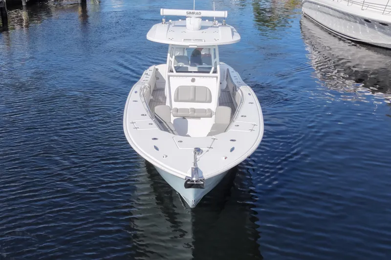 Slide: The Image of 2023 Cape Horn 32 XS boat on calm water, front view. - 5